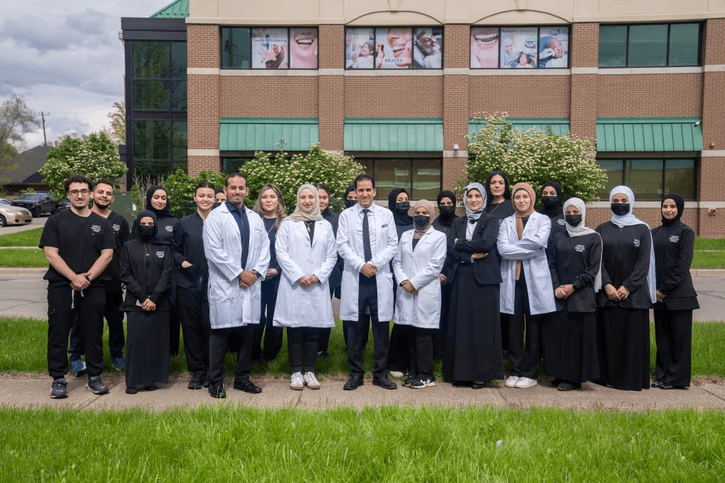 Smile Dental Care team outside the Dearborn clinic